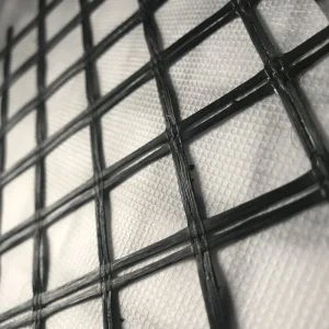 Fiberglass Geogrid Komposit dengan Geotextile